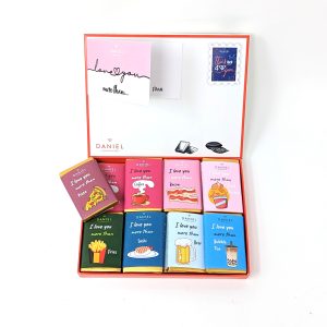 Daniel Chocolates_I love you more than… Envelope gift box Envelope-style gift box with 16 mini chocolate bars. 12 Dark, 4 Milk